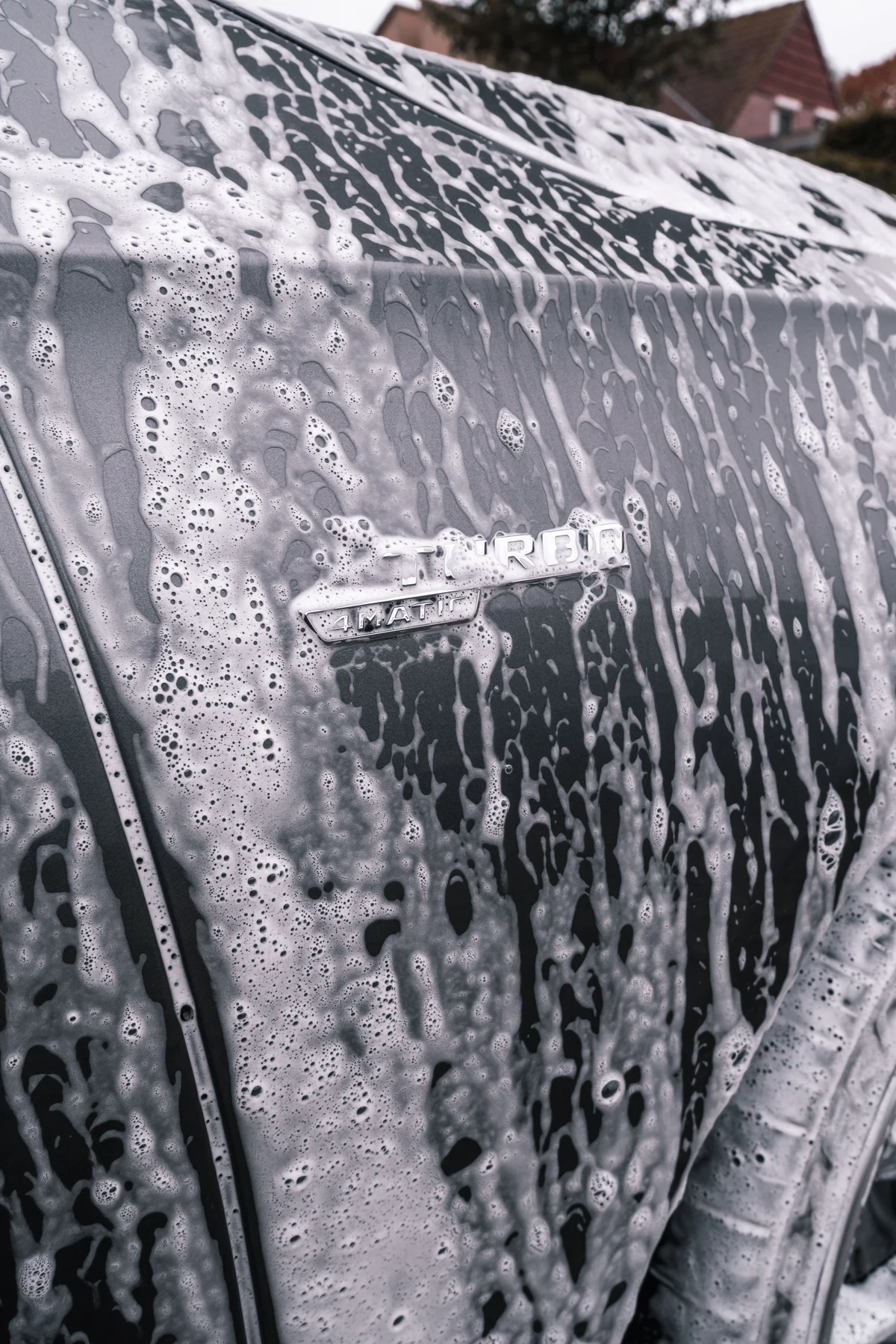 Car covered in detailing foam